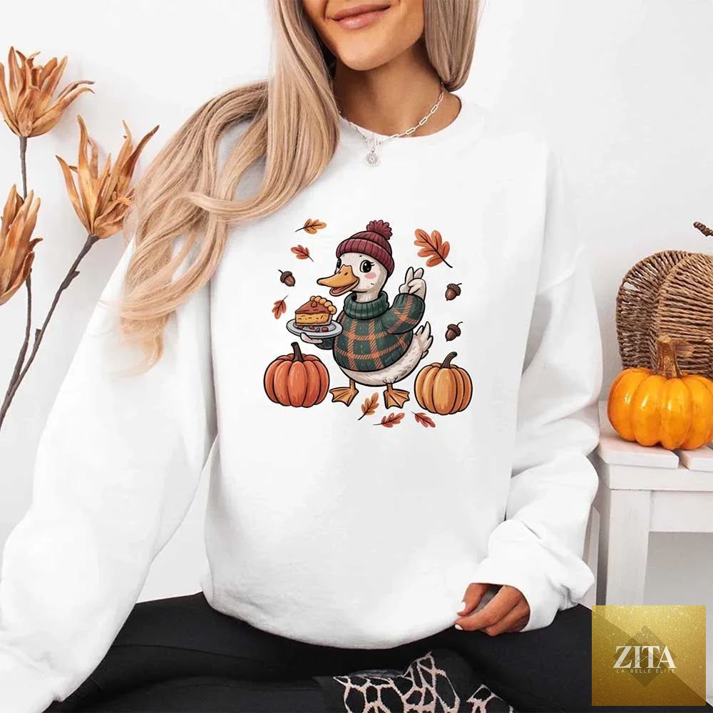 Adorb Custom Tees duck fall sweatshirt with cottagecore autumn design featuring coffee cups and pumpkins on a white crewneck.