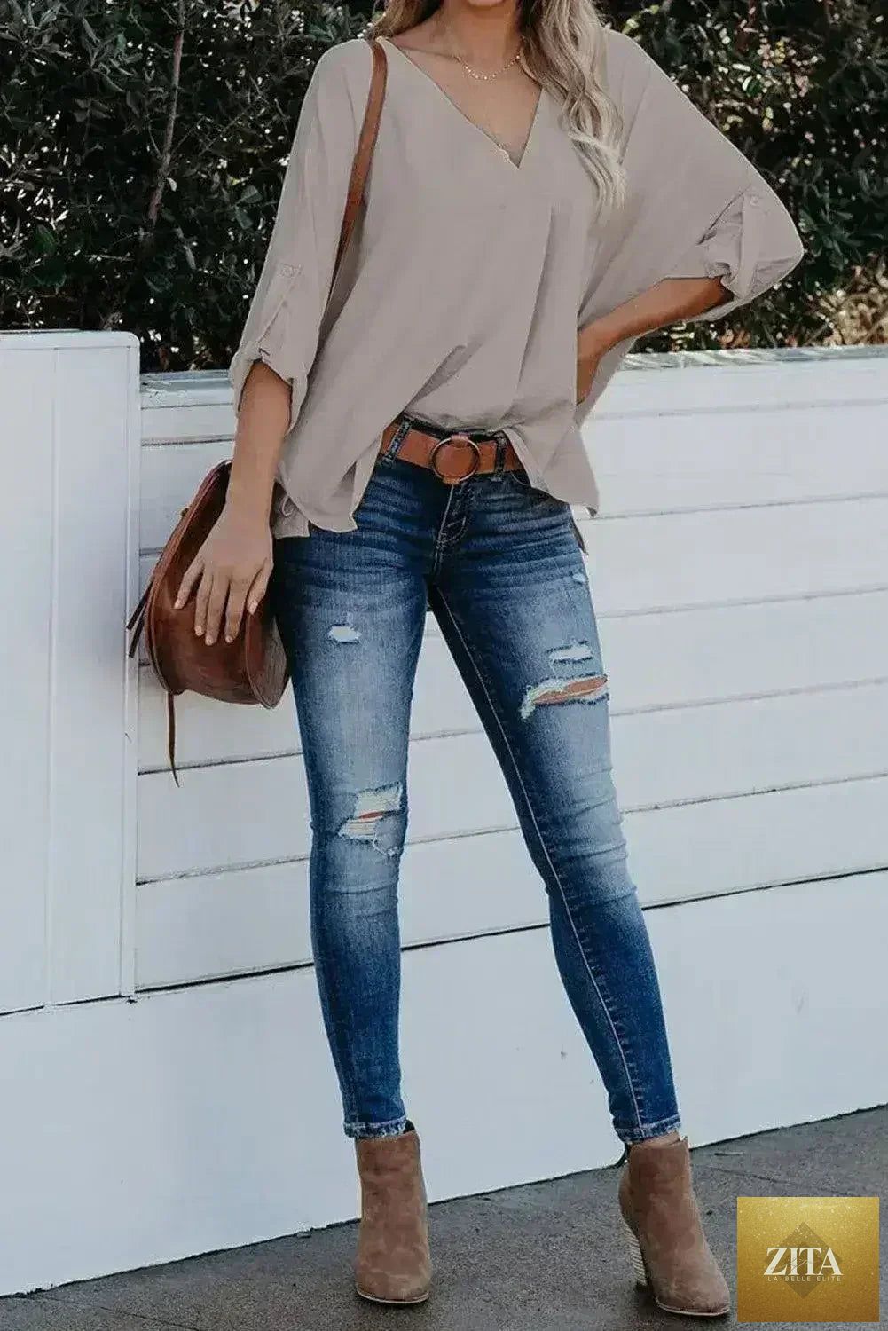 Femstylo elegant apricot V-neck blouse with 3/4 sleeves and high-low hem, perfect for stylish tops and blouses.