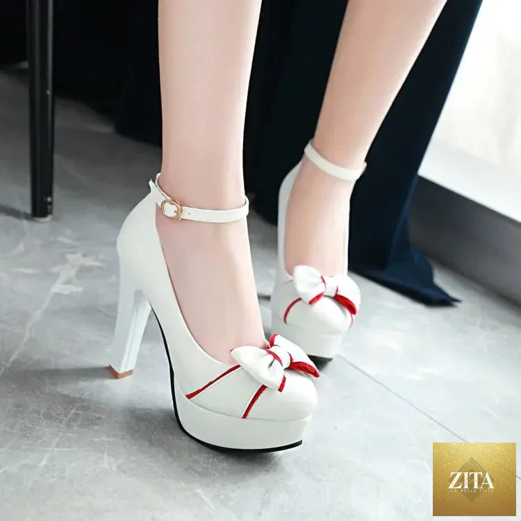 Women's waterproof chunky heels with strap, stylish and sturdy footwear from Trendy Attic Store01, shown in black leather.