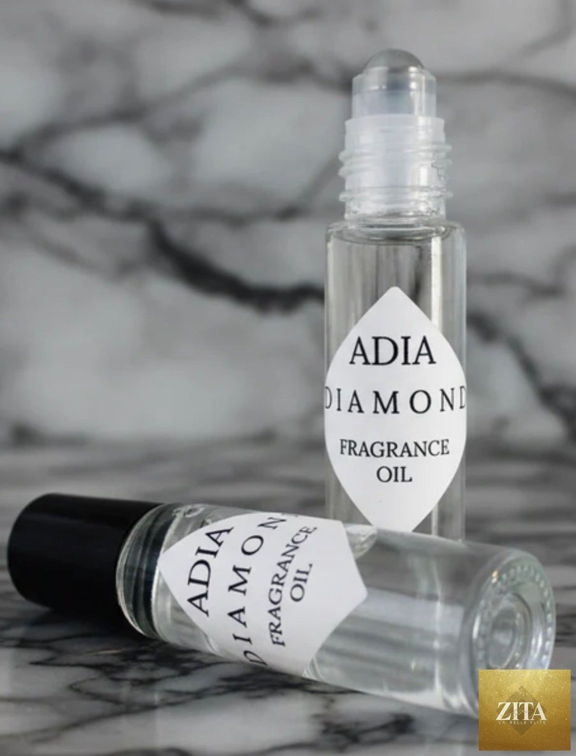 Diamond Natural Fragrance Oil by Zita La Belle Elite, clear glass bottle with dropper, showcasing the luxurious fragrance oil inside.