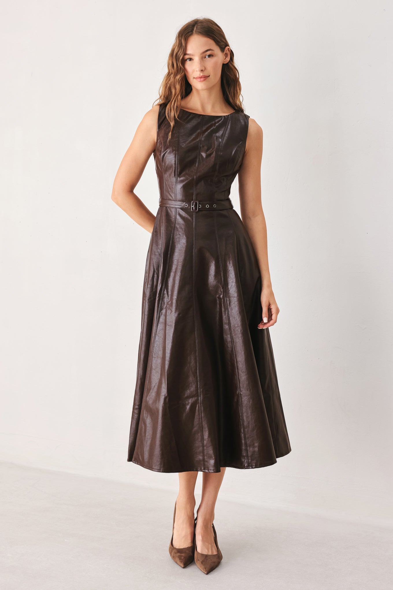 Dark brown faux leather midi dress by Flying Tomato, featuring a sleek, fitted silhouette and stylish design details.
