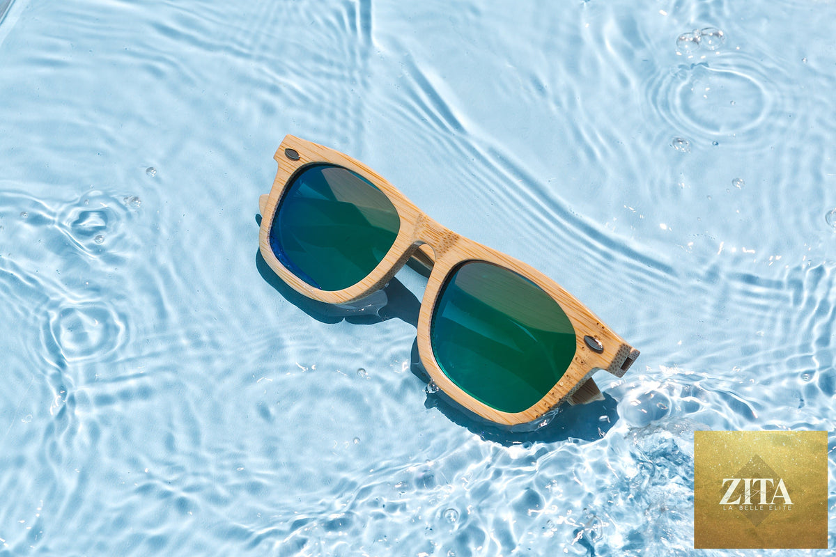 Bamboo floating sunglasses by Eastern Outer with round lenses and natural bamboo frames on a white background.