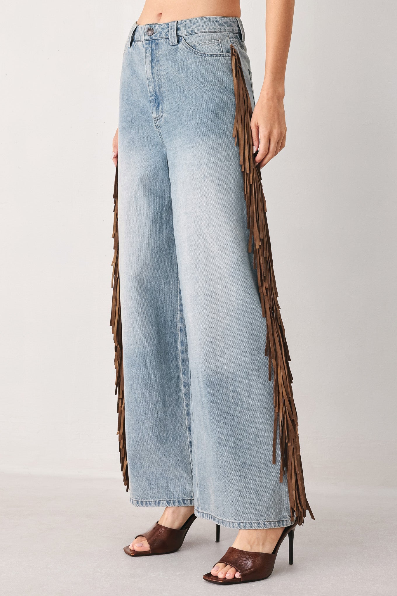 Light washed brown Nashville side washed denim pants by Flying Tomato, featuring a relaxed fit and classic denim detailing.