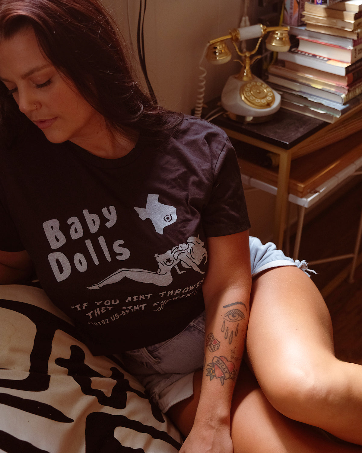 Baby Dolls BYOB crop top t-shirt by Feels So Good, featuring a stylish design and comfortable fit, shown on a model.
