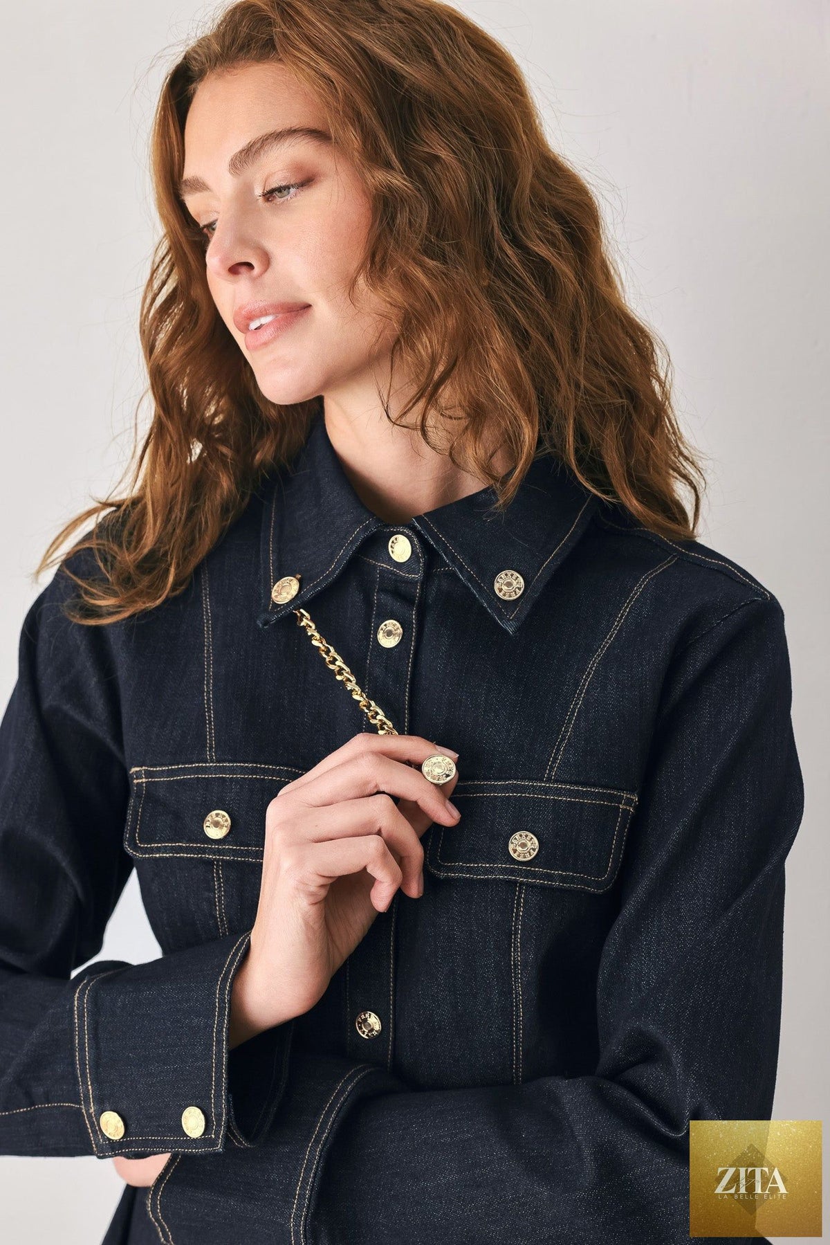 INDIGO ICON DARK INDIGO CHAIN-DETAIL PEPLUM DENIM TOP