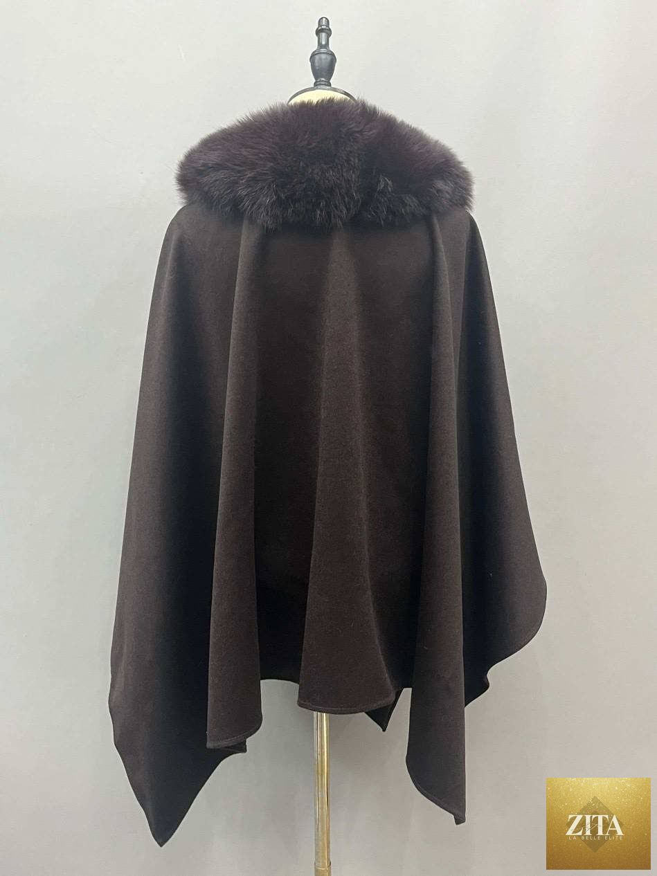 Luxurious Zita La Belle Elite cashmere and fox fur cape draped over a mannequin, showcasing soft texture and elegant style.
