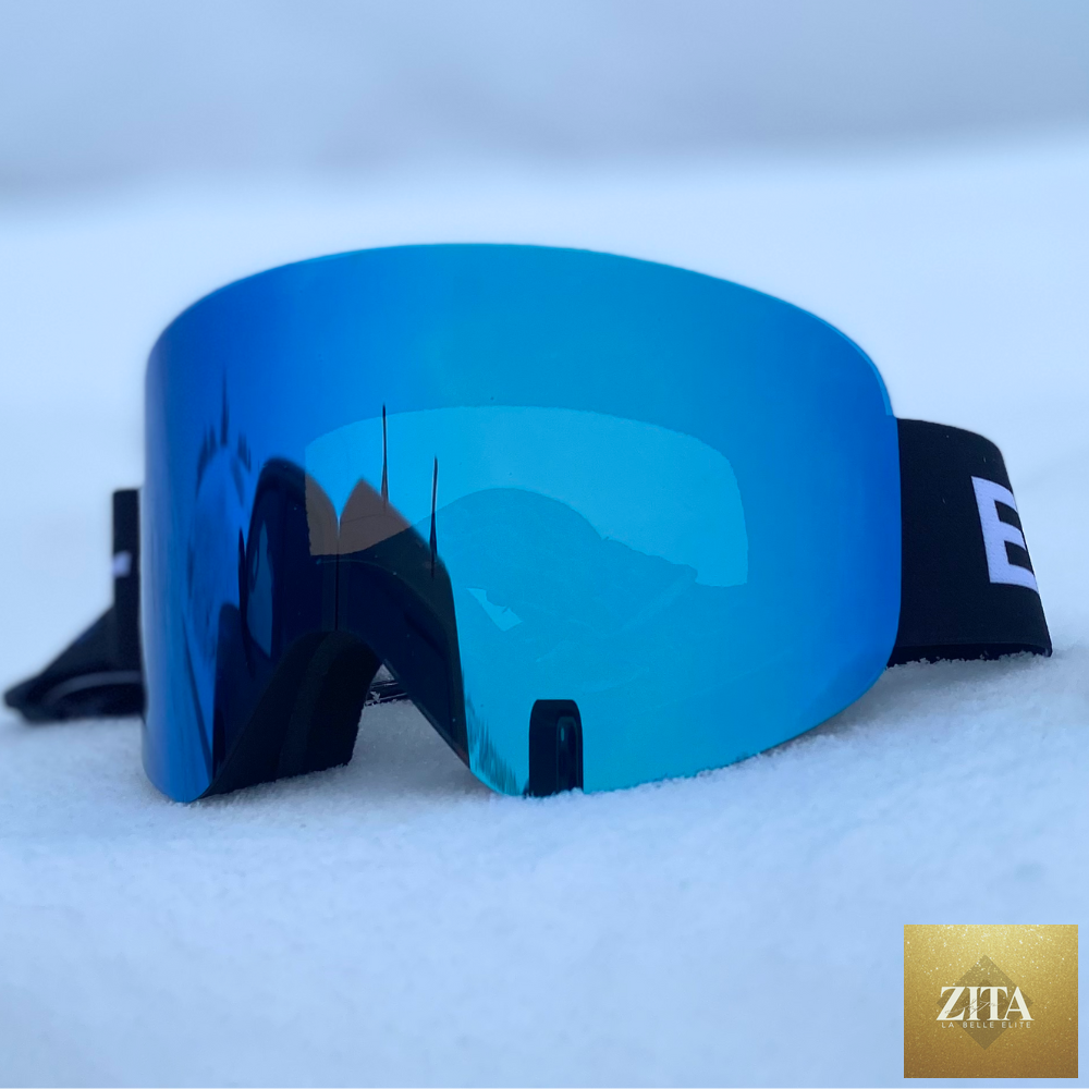 Blue Frameless MAG ski and snowboard goggles by Eastern Outer with tinted lenses and secure strap for winter sports.