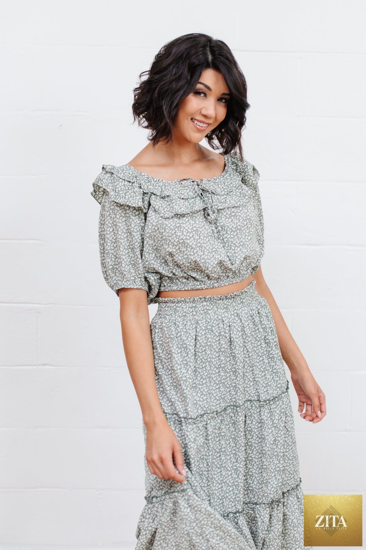 Womens Golden Hour Top in sage green by Thread & Co. Boutique, LLC, featuring a stylish, flowy design and soft fabric.