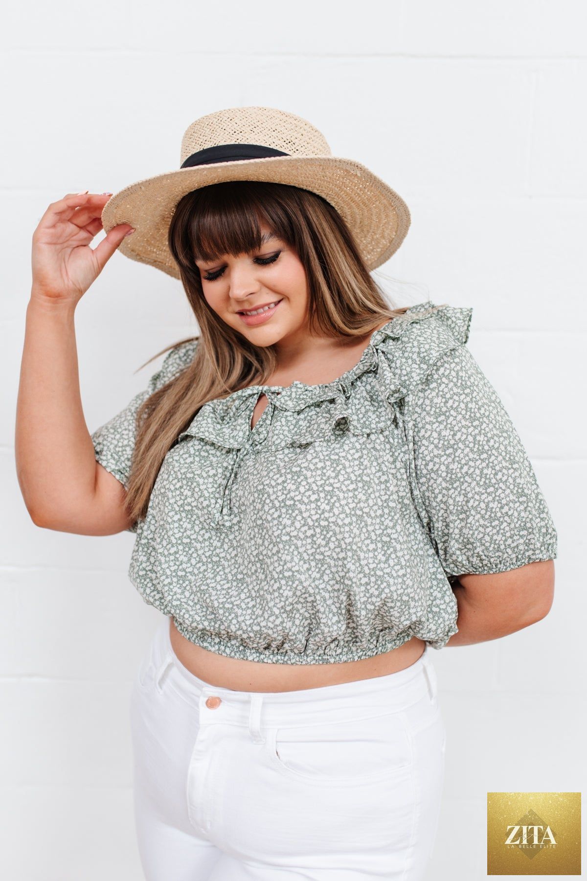 Women’s Golden Hour Top in sage color by Thread & Co. Boutique, LLC, featuring a stylish, comfortable design with a flattering fit.