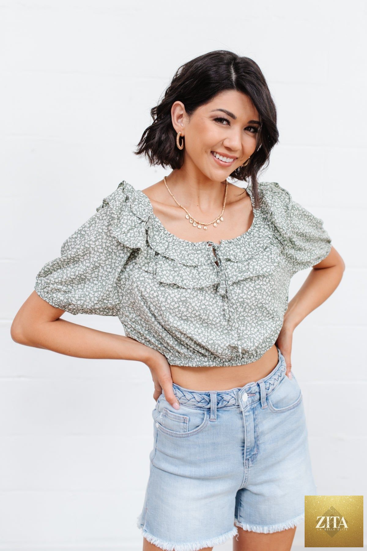 Womens Golden Hour Top in sage green by Thread & Co. Boutique, LLC, featuring a stylish, fitted design and soft fabric.