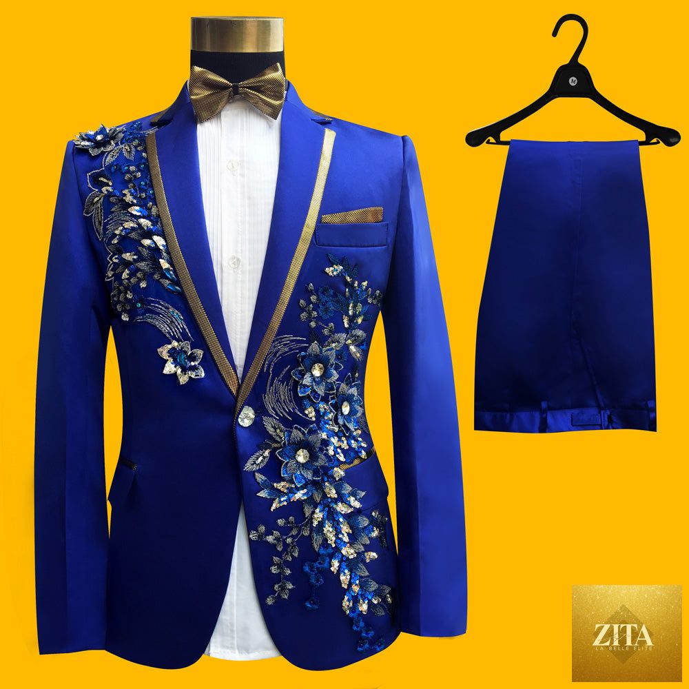 Blue embroidered slim fit men's blazer from donjohnbyvictoriacharles, part of a 4-piece suit set, shown on a hanger.