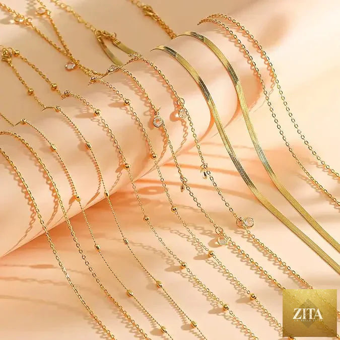8-piece gold-plated belly chain set with beaded, sequin, and CZ coin accents, adjustable body jewelry by MANDOTOS.