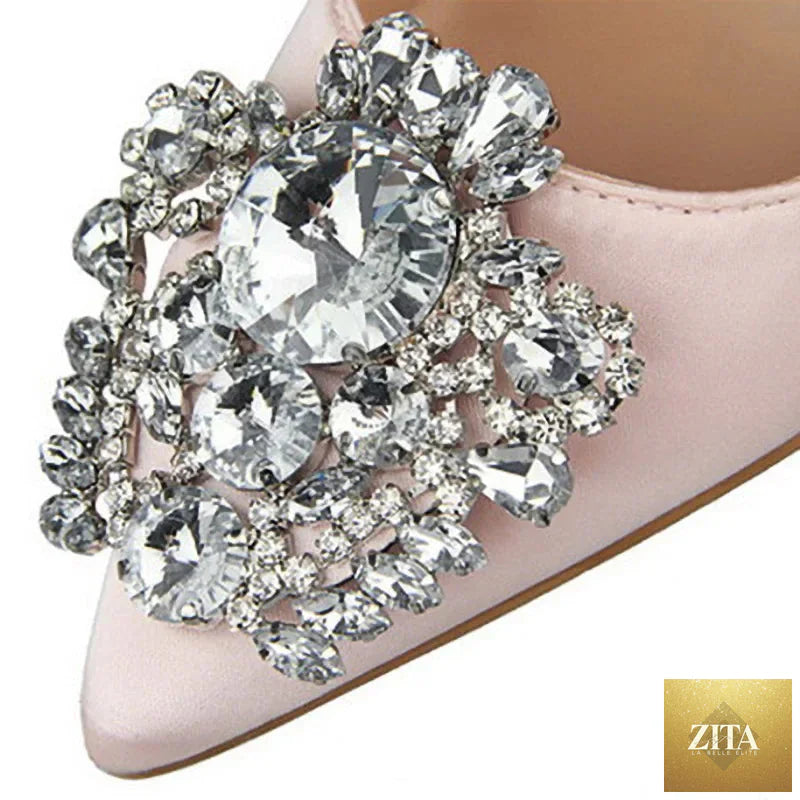 SMinvite LLC women's rhinestone stiletto pumps with high heels, featuring a sleek design and sparkling embellishments.