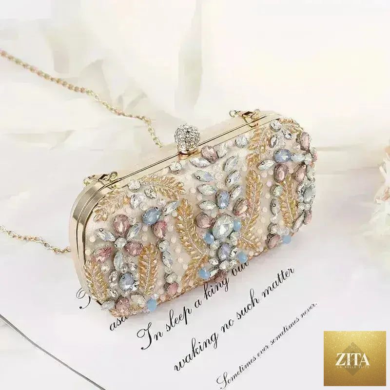 Femstylo luxury rhinestone clutch bag for weddings and parties, stylish handbag with sparkling embellishments and elegant design.