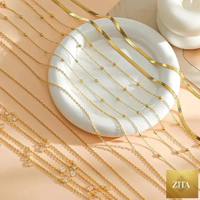 8-piece gold plated belly chain set featuring beaded, sequin, and CZ coin details, adjustable sexy bikini body jewelry by MANDOTOS.