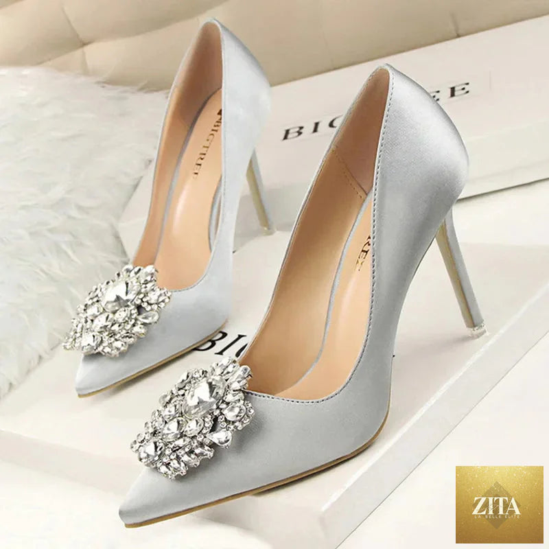 Elegant rhinestone women’s stiletto pumps with high heels, featuring sparkling embellishments and a sleek, stylish design.