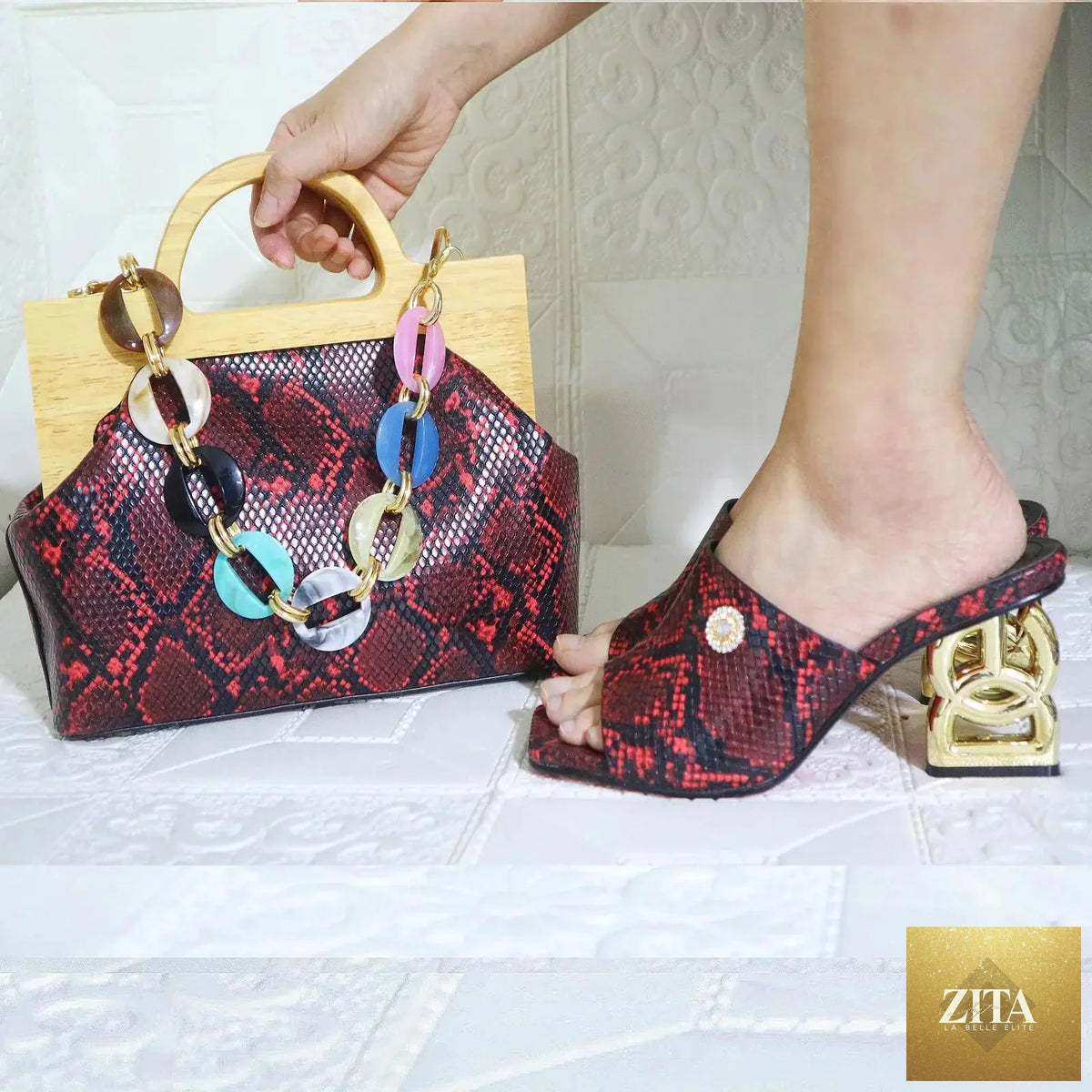 Elegant matching women shoes and bag set by EdleessFashion, luxurious footwear and handbag in stylish design.