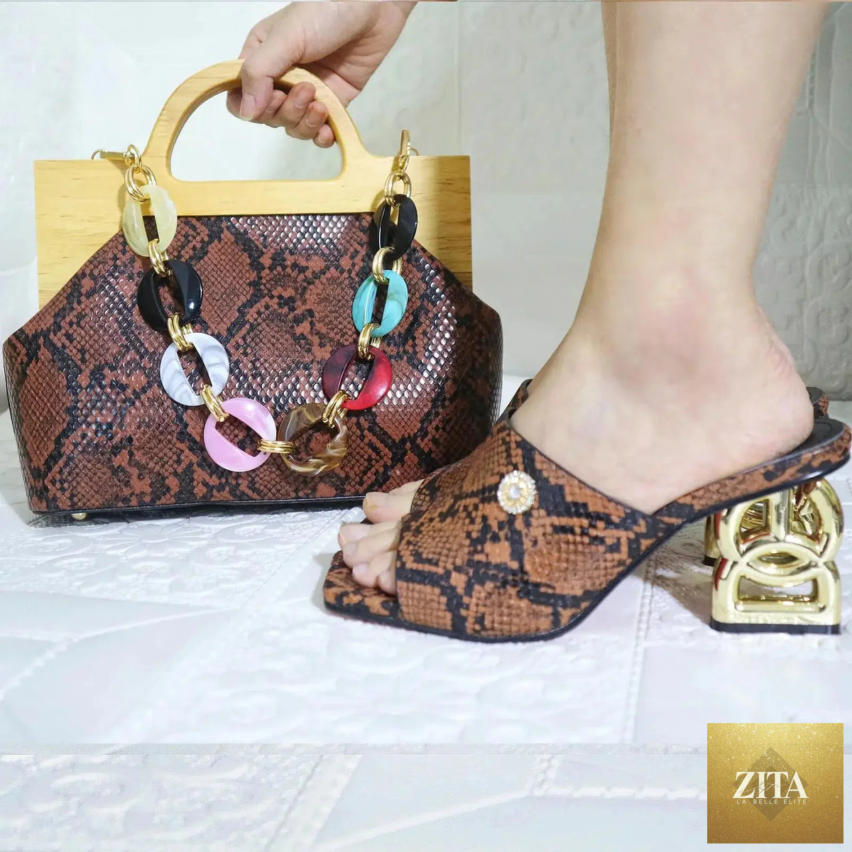 Elegant matching women’s shoes and bag set by EdleessFashion, featuring luxurious design, in a coordinated stylish look.