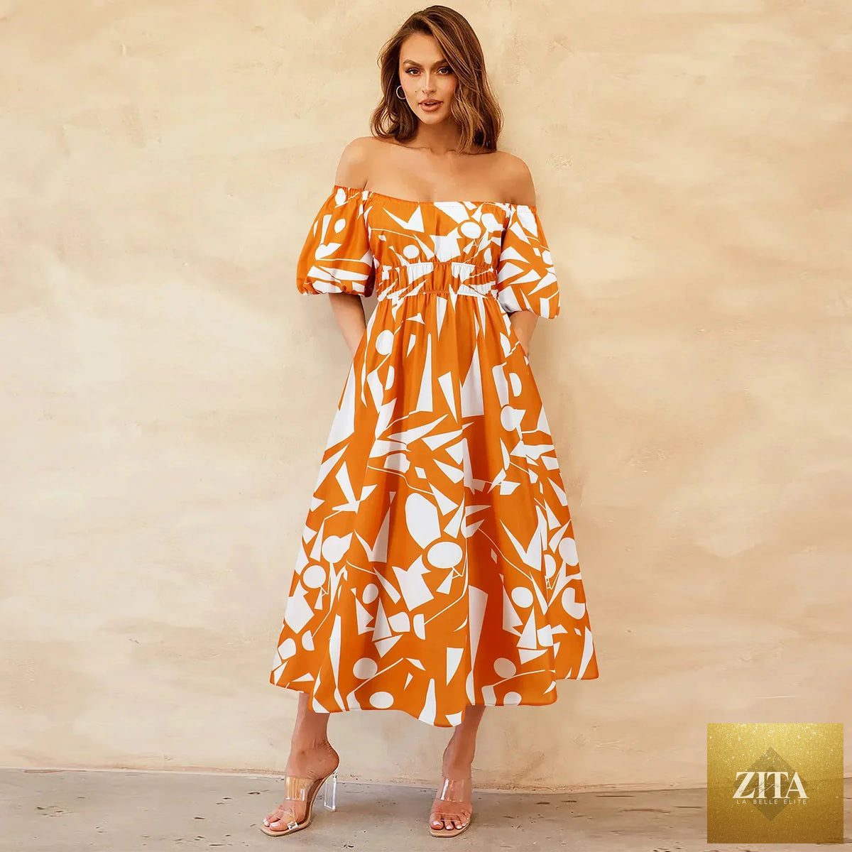 Women’s bohemian maxi dress with off-shoulder design, bubble sleeves, and printed fabric, perfect for a stylish, relaxed look.
