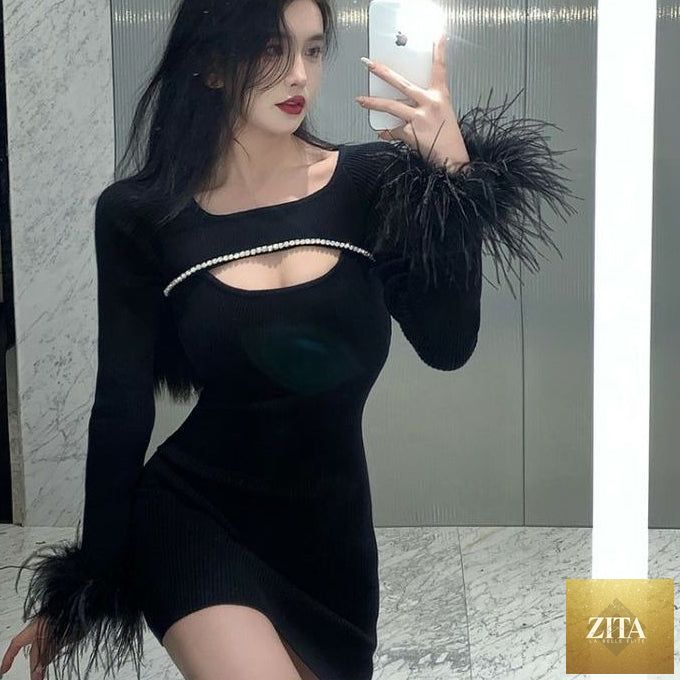 Black party dress with ostrich feather details by Zita La Belle Elite, showcasing a stylish and elegant women's dress.