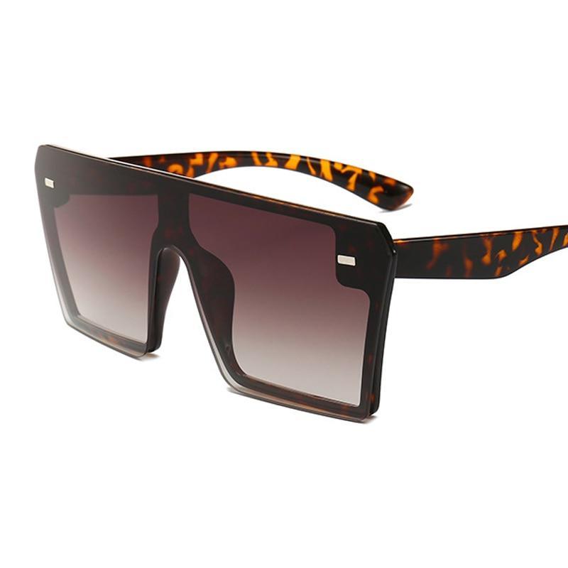 Stevvex oversized square sunglasses for women with mirror lenses and UV400 protection, stylish luxury fashion eyewear.