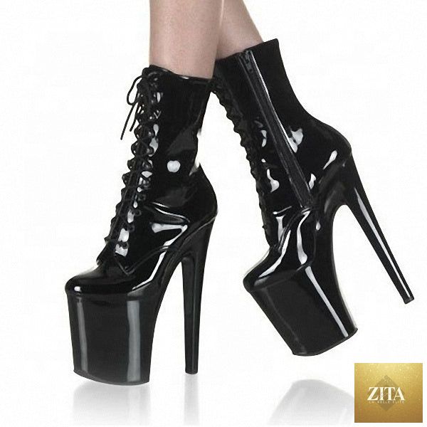 Black Zita La Belle Elite platform boots for women with 20cm heels, featuring a sleek, sexy design and high-rise style.