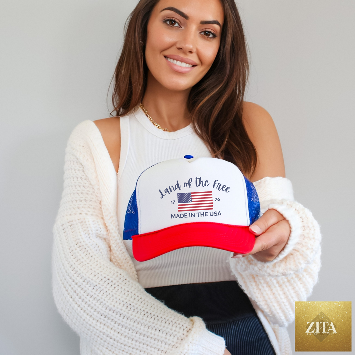 Hey Jude Graphic Tees Land Of The Free trucker hat with adjustable mesh back and embroidered front design.