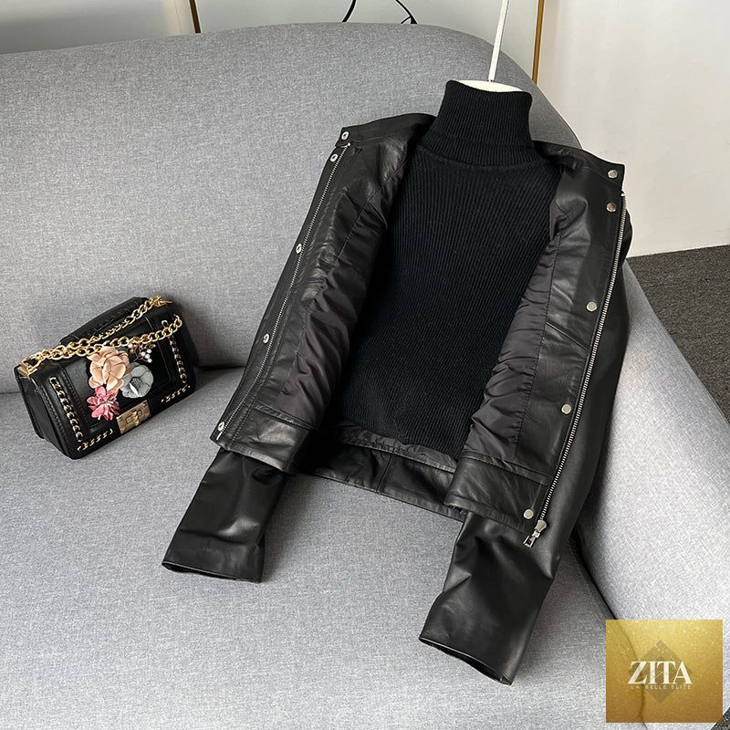 Black sheepskin leather jacket for women by Zita La Belle Elite, featuring a stylish fitted design with lapel collar and zipper details.