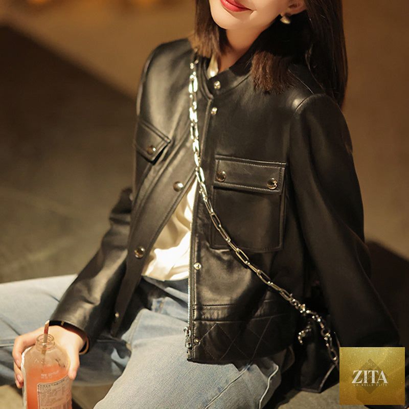 Black sheepskin leather jacket for women by Zita La Belle Elite, showing the sleek, fitted design with collar and front zipper.