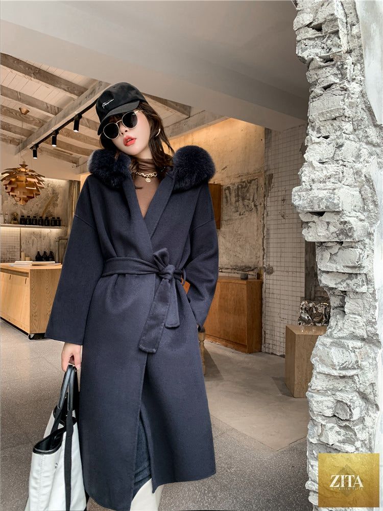 Women's cashmere coat with a luxurious fox fur collar by Zita La Belle Elite, showcasing elegant craftsmanship and soft fabric.