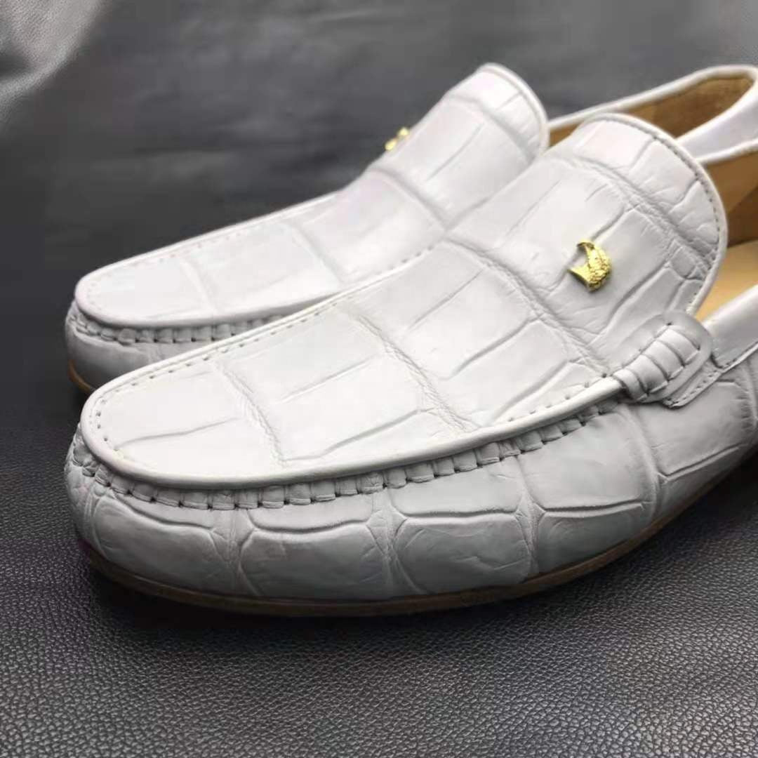 White crocodile leather loafers by Don John, handcrafted men's dress shoes with a sleek, polished appearance.
