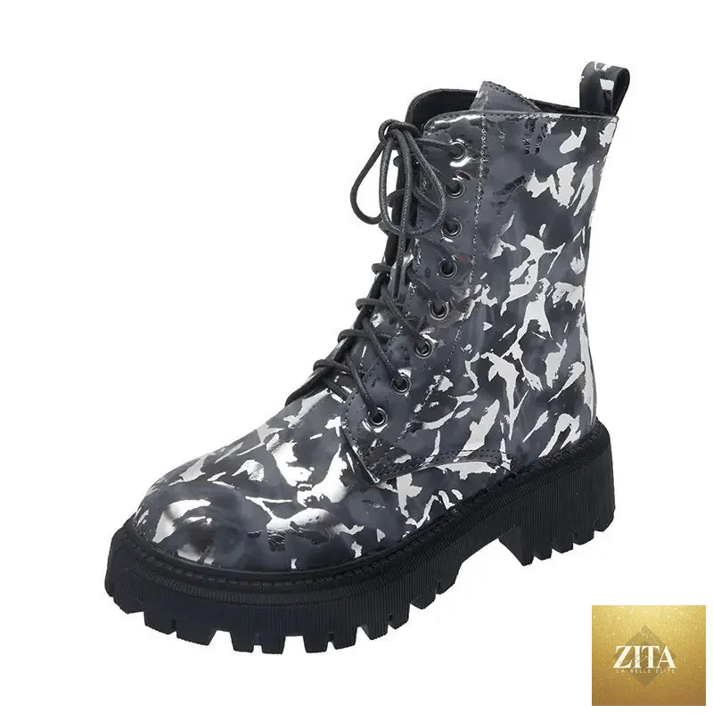 Women's floral Martin boots by Trendy Attic Store01, stylish warm winter motorcycle boots with floral design and sturdy sole.