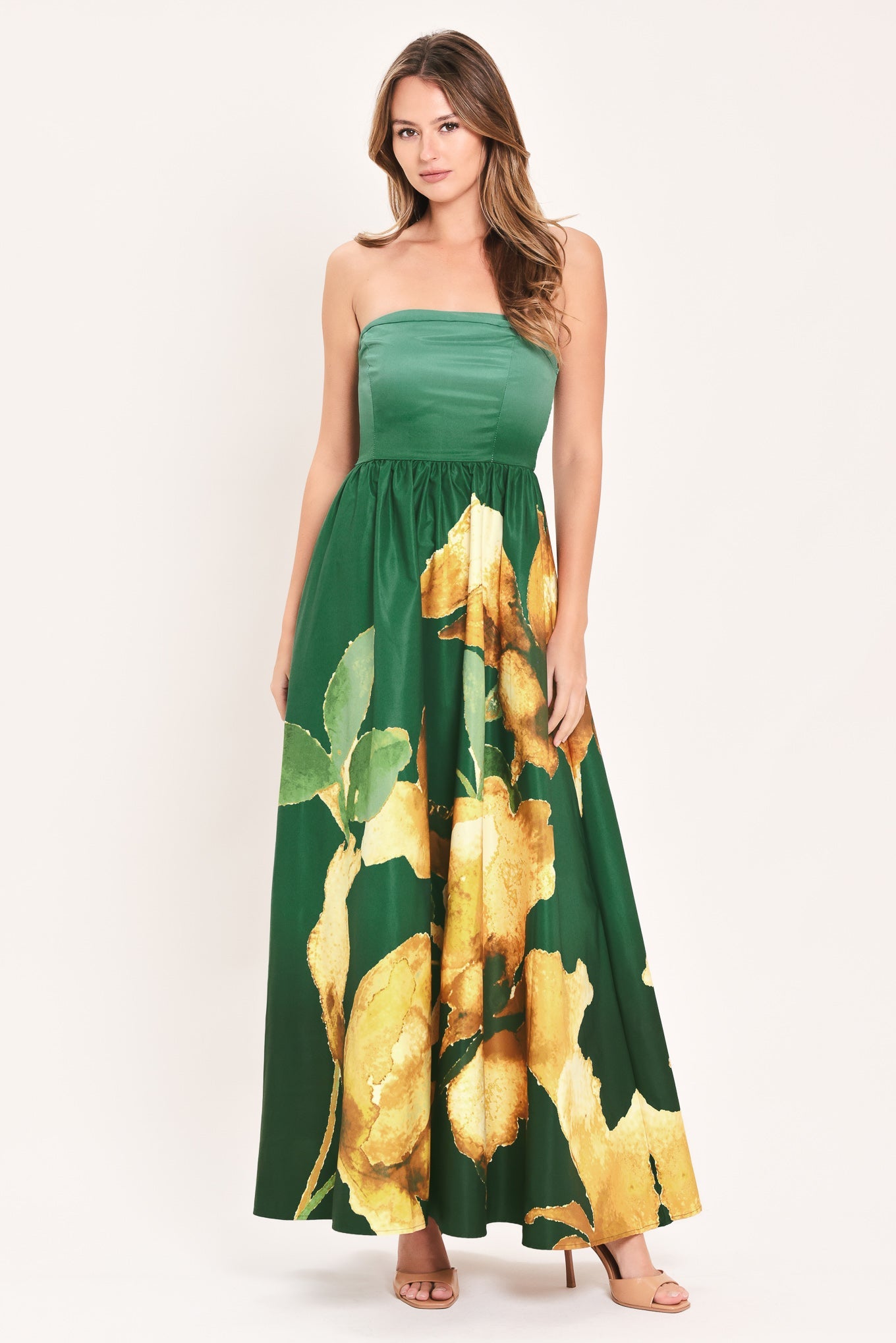 Flying Tomato Golden Rose Afterglow woven maxi dress in green, flowing fabric with intricate pattern, full-length design, and sleeveless style.