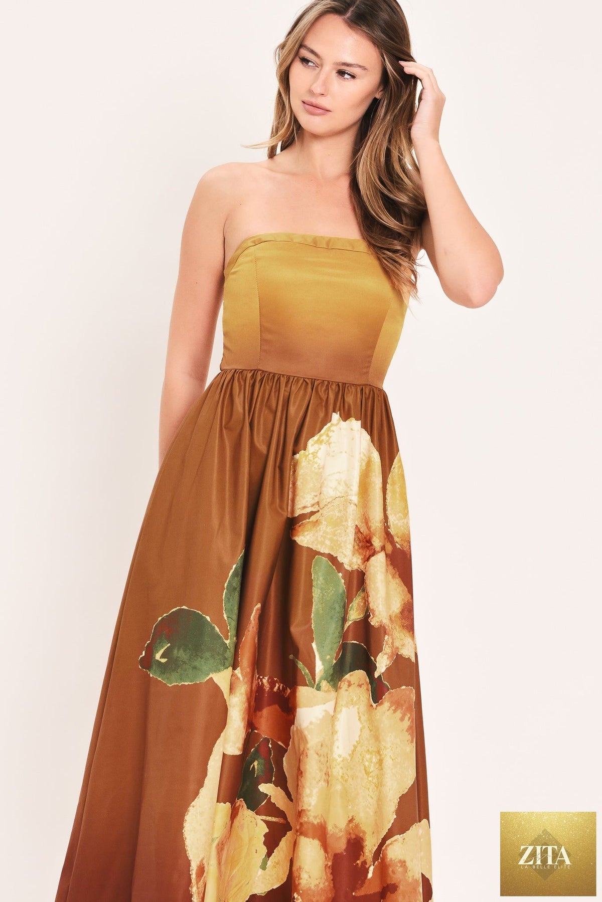 Rust-colored Golden Rose Afterglow Woven Maxi Dress by Flying Tomato, featuring a flowing fabric and intricate woven design.