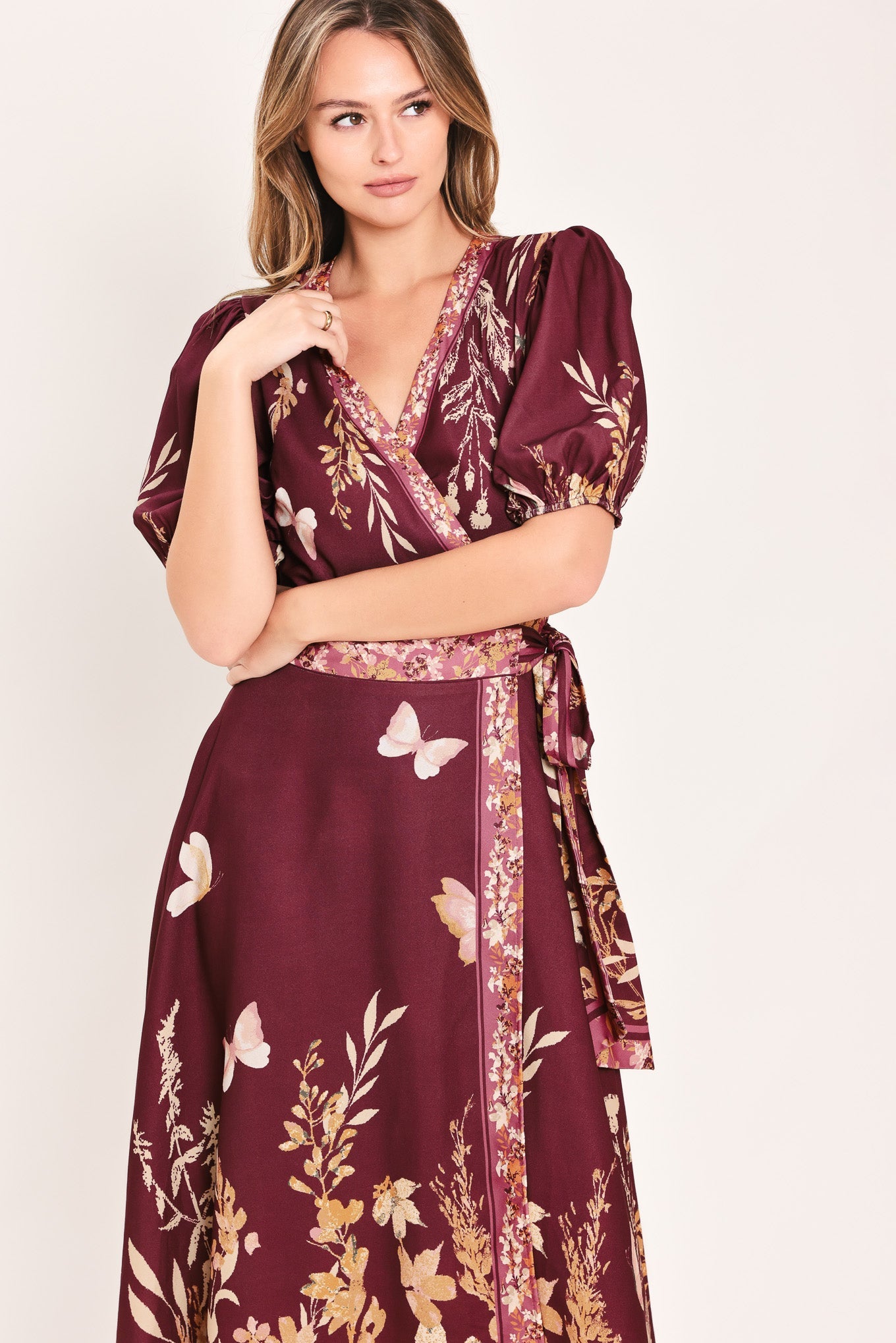 Flying Tomato Plum Garden Enchantment woven midi dress in burgundy mustard, featuring floral patterns and a flowing silhouette.