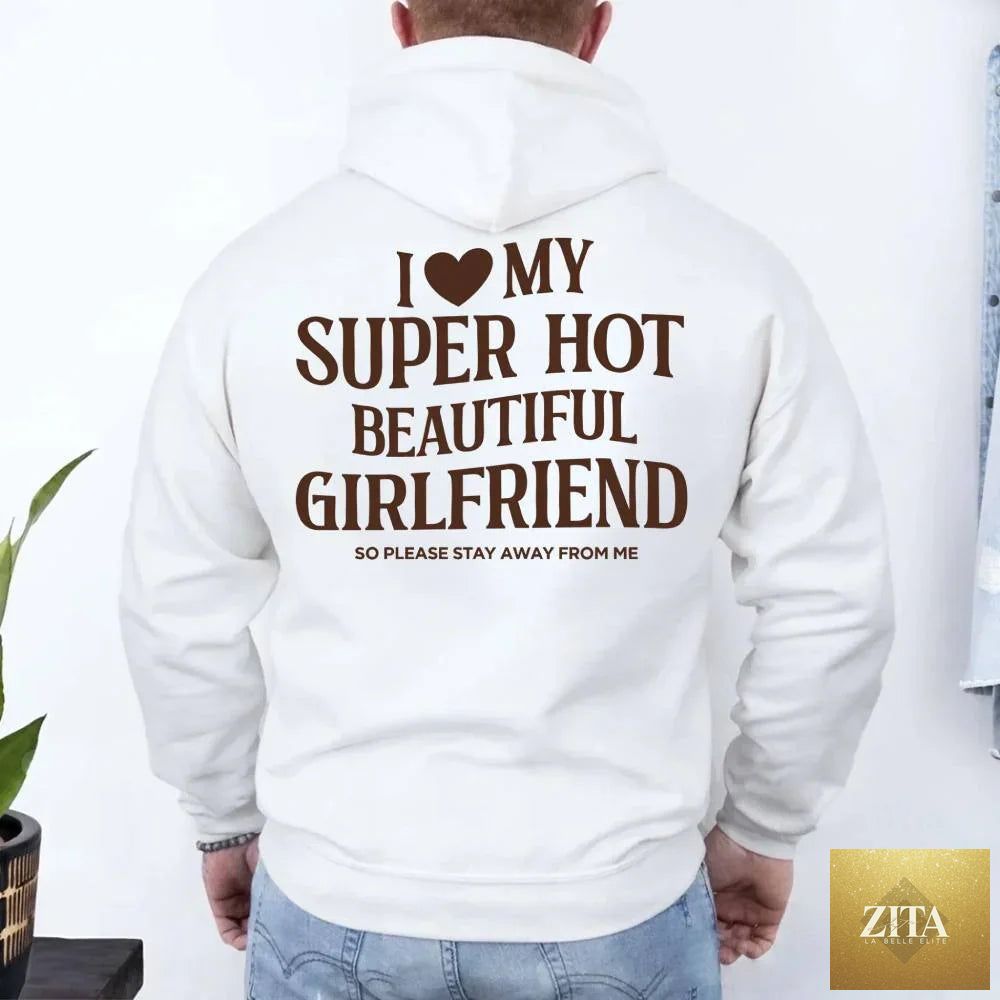 Pink hoodie from Adorb Custom Tees with "I Love My Super Hot Beautiful Girlfriend Valentine’s" text, casual and comfortable style.