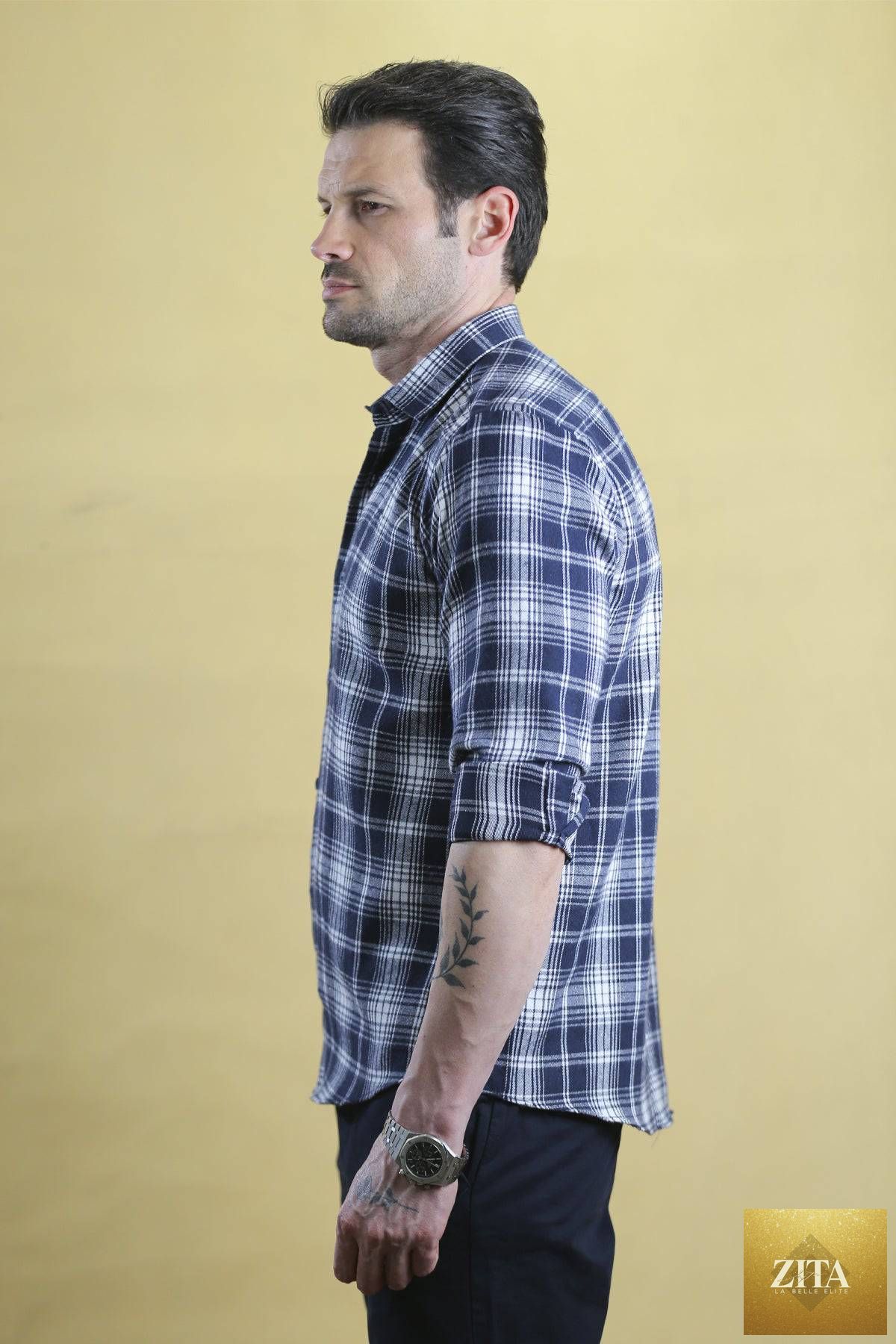 Bright Moons The Woodsman Shirt in navy plaid, featuring a classic button-up design with a collar and long sleeves.