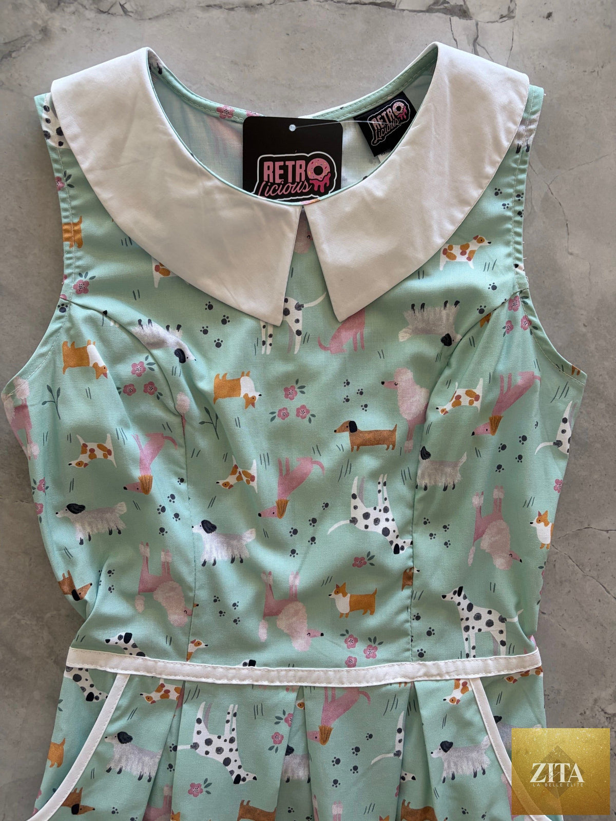 Retrolicious dogs collared dress featuring a stylish, colorful design with a collar detail, perfect for small dog fashion.
