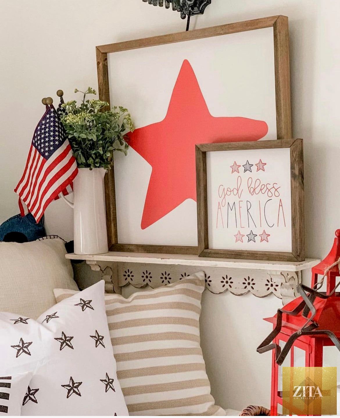 Red, white, and blue framed art with "God Bless America" patriotic saying by Zita La Belle Elite, featuring bold lettering on a white background.