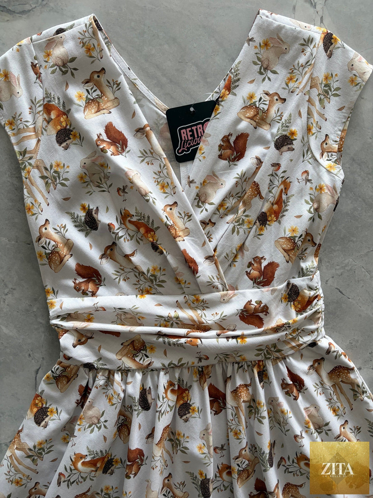 Retrolicious Woodland Animals Greta Dress featuring a charming woodland animal print and a classic dress silhouette.
