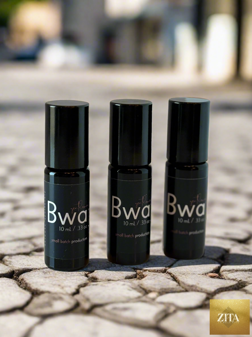 Three bottles of Zita La Belle Elite Bwa perfume oil for men, showcasing sleek packaging and functional fragrance design.