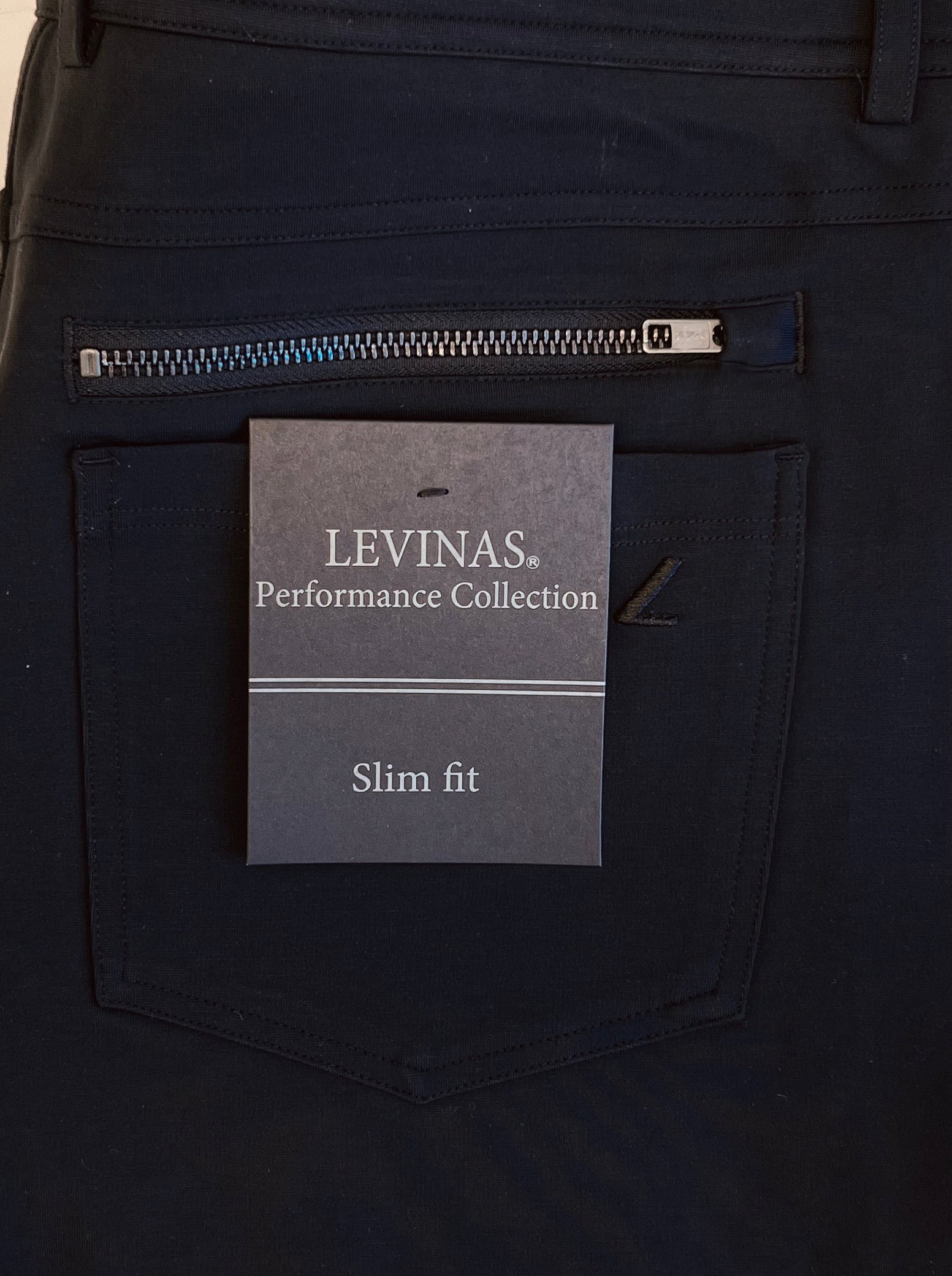 Black Super-Stretch Men's Chinos by LEVINAS® Official, casual pants from the Performance Collection, shown in the image.