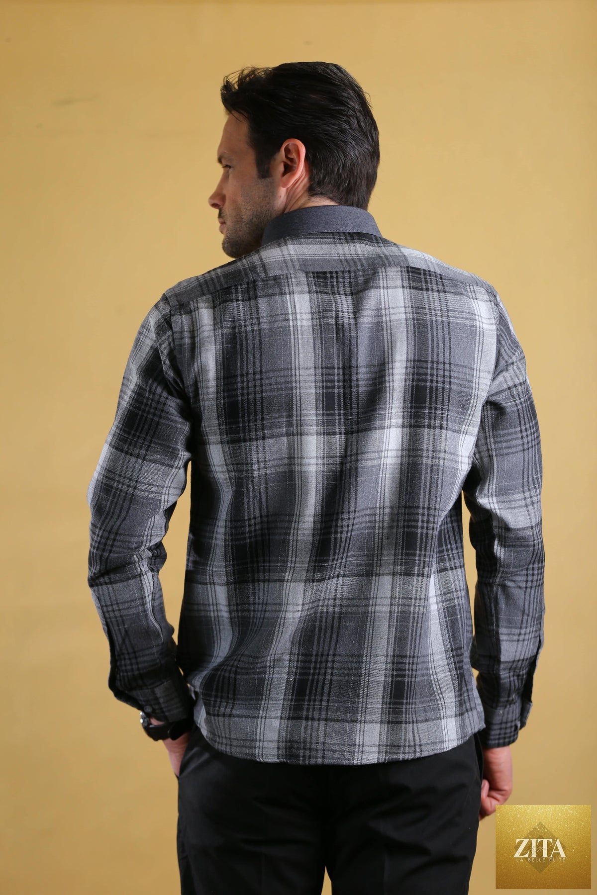 Bright Moons Woodsman Shirt in earthy tones, featuring button-up front and rugged style, displayed on a mannequin.