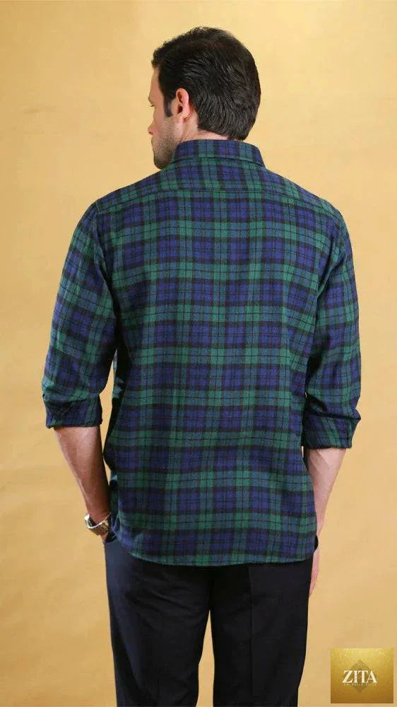 Bright Moons Woodsman Shirt shown in a rustic outdoor setting, featuring durable fabric and classic plaid design.