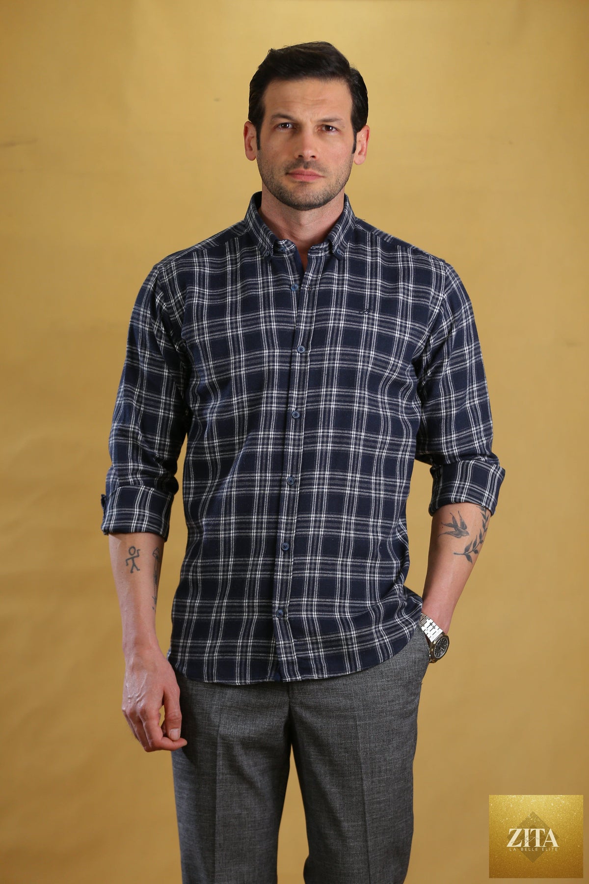 Bright Moons Woodsman Shirt in navy plaid, featuring a classic button-up design with a collar and chest pockets.