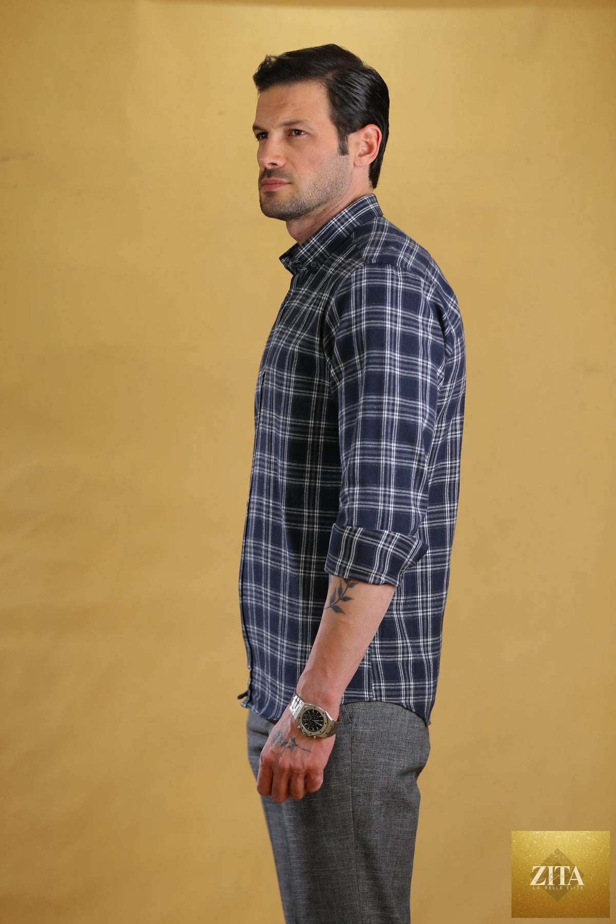 Bright Moons Woodsman Shirt in navy plaid, featuring a classic button-up design with a collar and chest pocket.