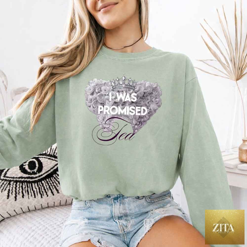 Comfort Colors long sleeve T-shirt featuring "I Was Promised Tea" design, styled in a relaxed fit, perfect for book lovers.
