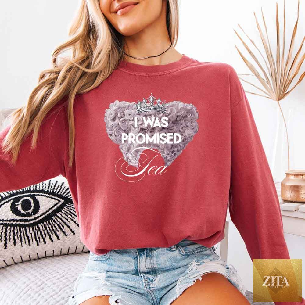 Crimson long sleeve T-shirt with "I Was Promised Tea" slogan from Comfort Colors, featuring classic book-inspired design by Adorb Custom Tees.