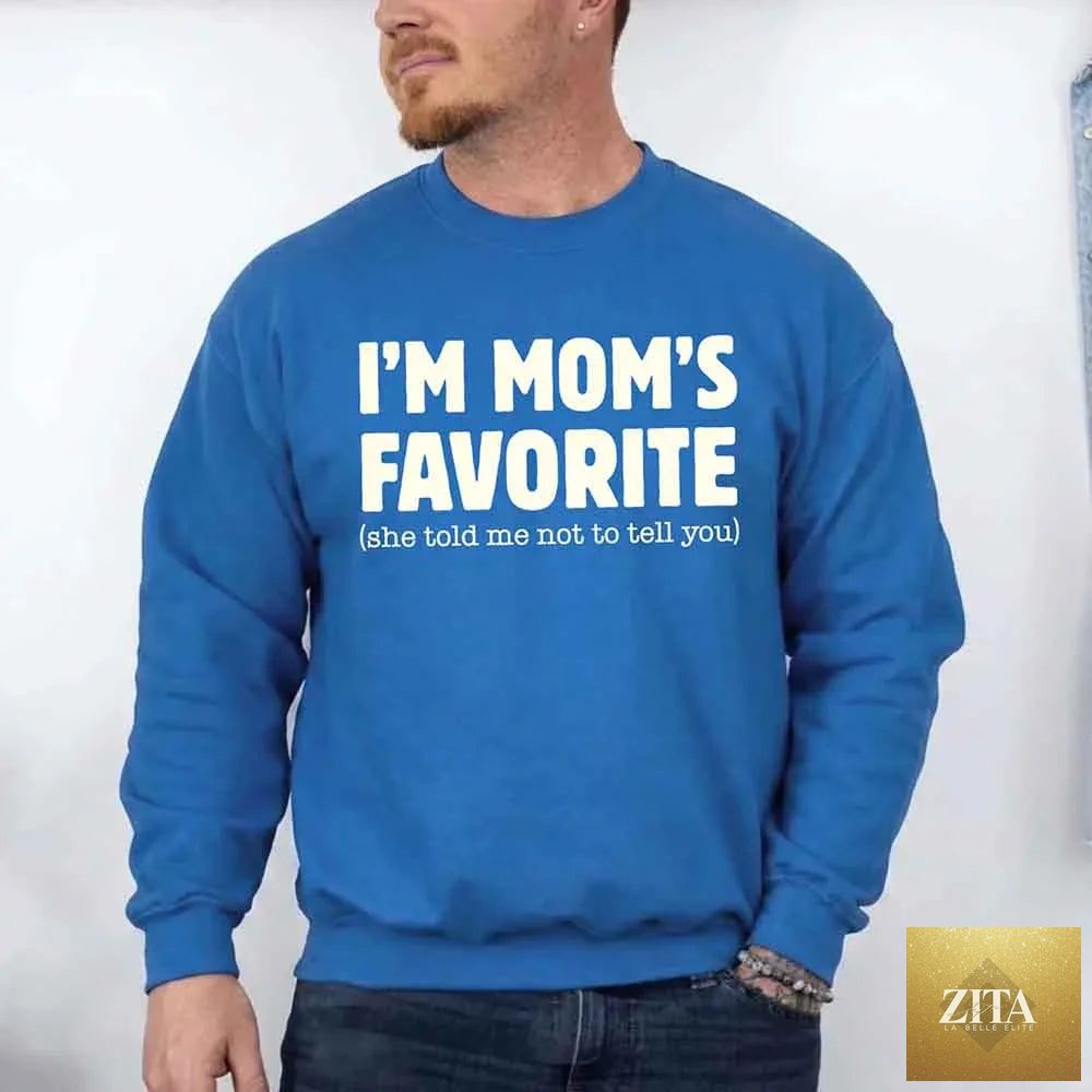 Unisex "I'm Mom’s Favorite" sweatshirt by Adorb Custom Tees featuring humorous design for sons and daughters.