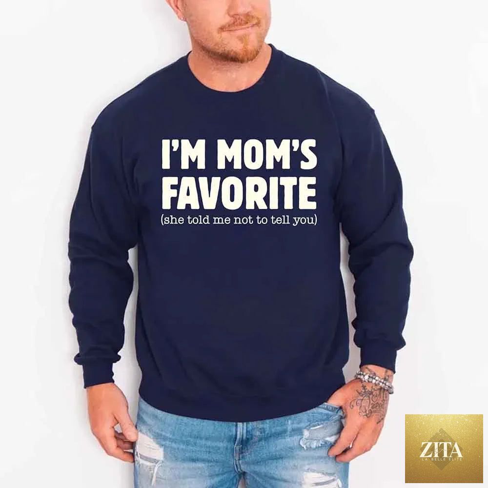 Unisex gray sweatshirt with "I'm Mom's Favorite" print, featuring humorous design for sons and daughters, by Adorb Custom Tees.